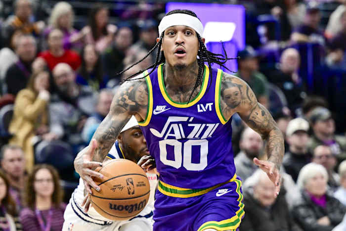 Jan 10, 2024; Salt Lake City, Utah, USA; Denver Nuggets forward/guard Justin Holiday (9) reaches for the ball by Utah Jazz guard Jordan Clarkson (00) during the second half at the Delta Center.